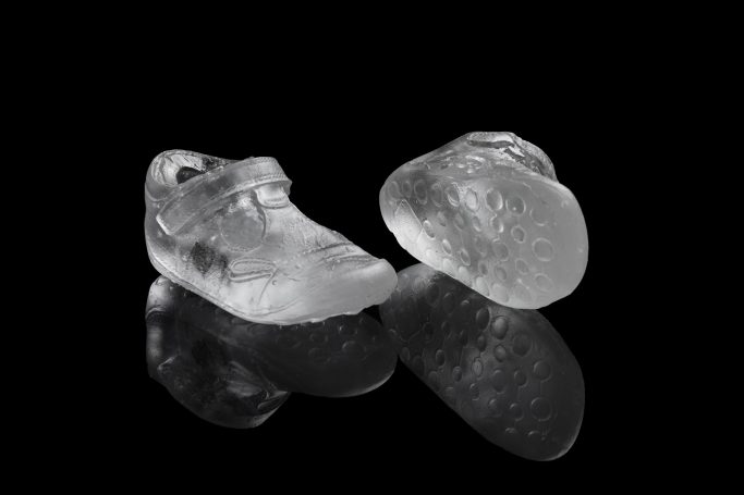 Cast clear glass baby shoes 