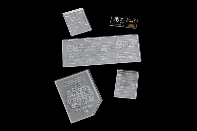 Screen printed tickets and passport with white enamel on sand blasted glass